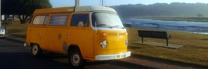 vw-camper-beside-river